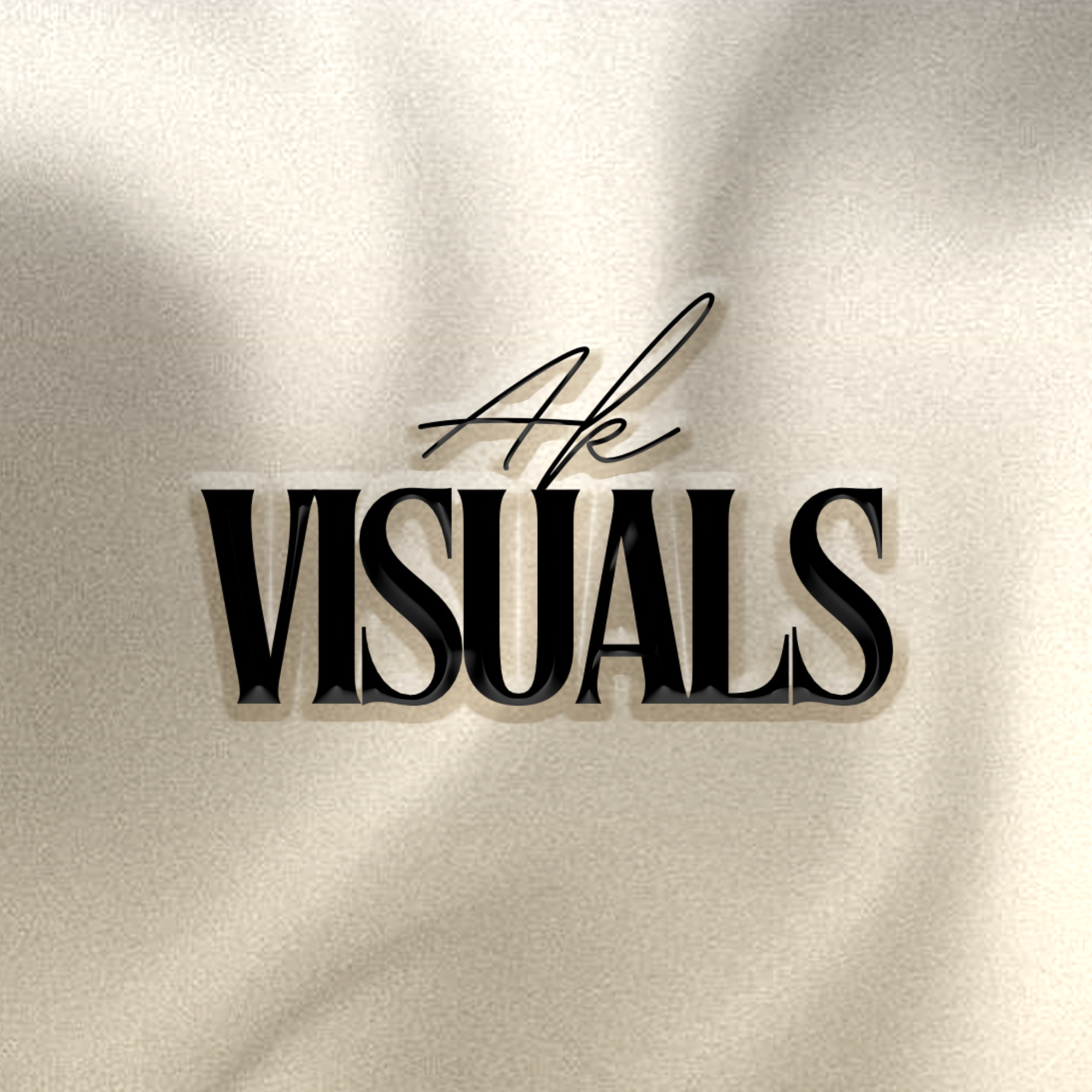 AK Visuals logo artwork over satin cloth